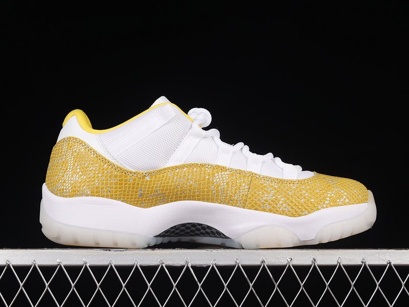 AIR Jordan 11 Low Yellow Snakeskin Sneakers - White Unisex Streetwear Limited Edition - Embrace bold sophistication with the Air Jordan 11 Low Yellow Snakeskin White/Tour Yellow/Sail, a striking