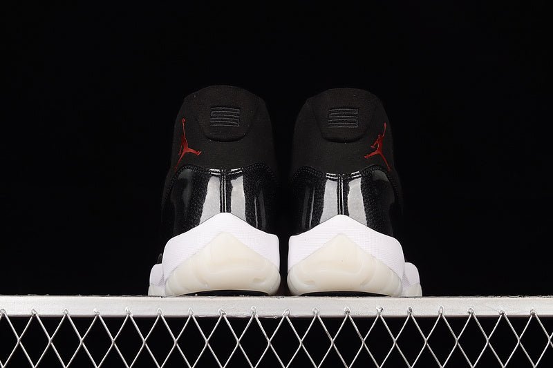 AIR Jordan 11 Retro 72-10 - - Varsity Red - Black Unisex Streetwear Limited Edition - Celebrate basketball history with the Air Jordan 11 Retro 72-10 Black/Black/Varsity Red, a homage to