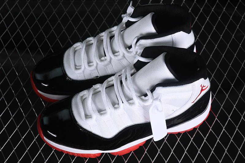 AIR Jordan 11 Retro - White - Red - Black Unisex Streetwear Limited Edition - Experience the epitome of basketball heritage with the Air Jordan 11 Retro Black/White/Red, a sneaker