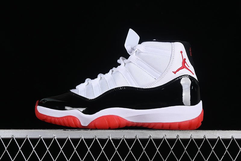 AIR Jordan 11 Retro - White - Red - Black Unisex Streetwear Limited Edition - Experience the epitome of basketball heritage with the Air Jordan 11 Retro Black/White/Red, a sneaker