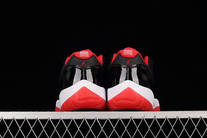 AIR Jordan 11 Retro Low Bred - True Red - White - Black Unisex Streetwear Limited Edition - Step into legendary style with the Air Jordan 11 Retro Low Bred Black/True Red/White, a