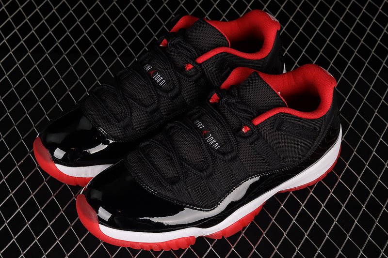 AIR Jordan 11 Retro Low Bred - True Red - White - Black Unisex Streetwear Limited Edition - Step into legendary style with the Air Jordan 11 Retro Low Bred Black/True Red/White, a