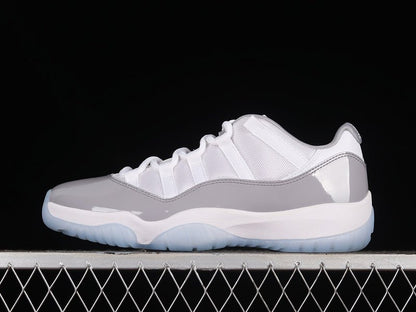 AIR Jordan 11 Retro Low - University Blue Sneakers - White Unisex Streetwear Limited Edition - Step into classic elegance with the Air Jordan 11 Retro Low White/University Blue, a timeless