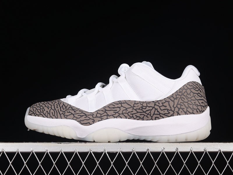 AIR Jordan 11 Retro Low - University Blue Jogger Pants - White Unisex Streetwear Limited Edition - Step into timeless elegance with the Air Jordan 11 Retro Low White/University Blue, a classic
