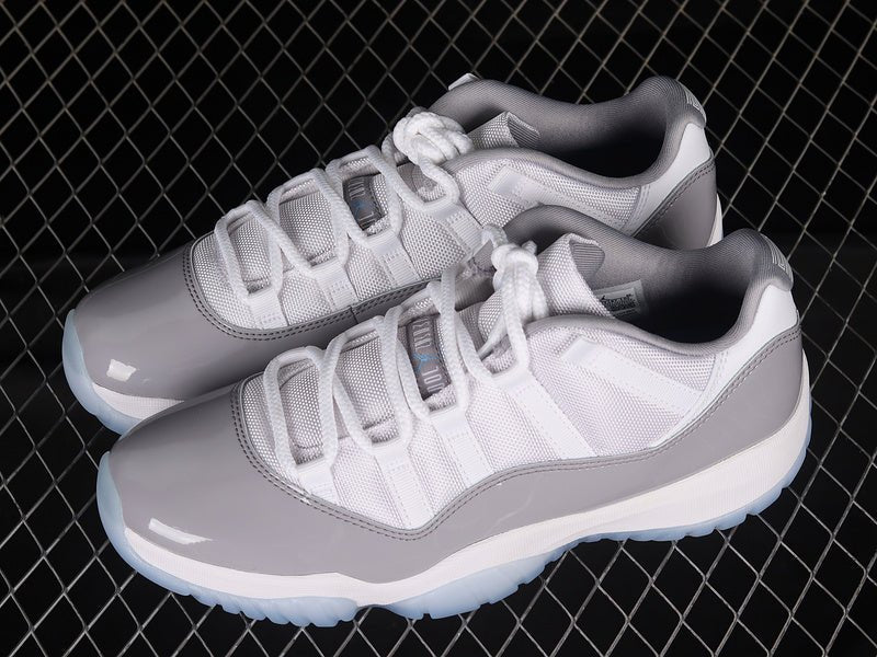 AIR Jordan 11 Retro Low - University Blue Sneakers - White Unisex Streetwear Limited Edition - Step into classic elegance with the Air Jordan 11 Retro Low White/University Blue, a timeless
