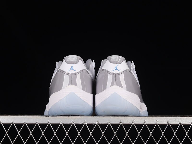 AIR Jordan 11 Retro Low - University Blue Sneakers - White Unisex Streetwear Limited Edition - Step into classic elegance with the Air Jordan 11 Retro Low White/University Blue, a timeless