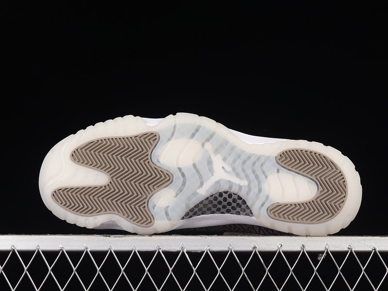 AIR Jordan 11 Retro Low - University Blue Jogger Pants - White Unisex Streetwear Limited Edition - Step into timeless elegance with the Air Jordan 11 Retro Low White/University Blue, a classic