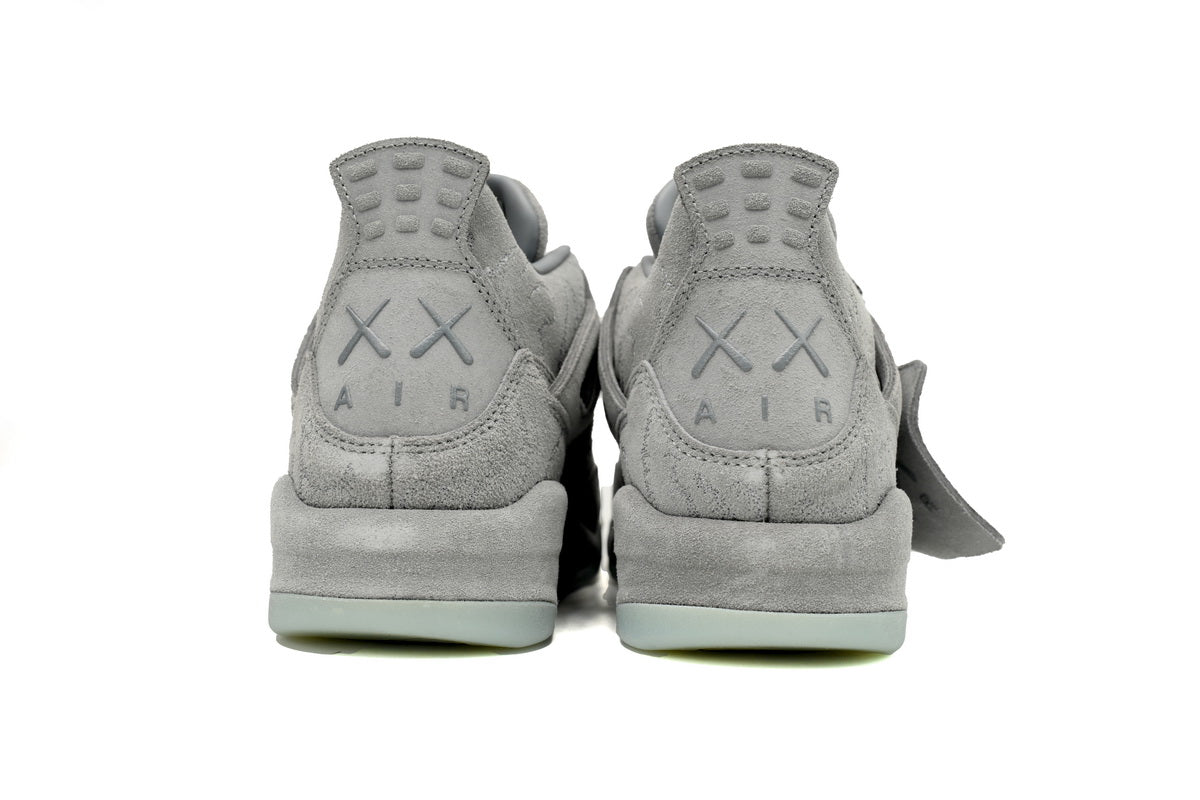 Air Jordan 4 Retro Kaws - Grey Unisex Streetwear Limited Edition - **Air Jordan 4 Retro KAWS Grey** The Air Jordan 4 Retro KAWS Grey is a