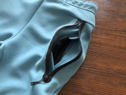 PANTALON EN FUZILLE TECH DE NIKE x BLEU BEBÉ