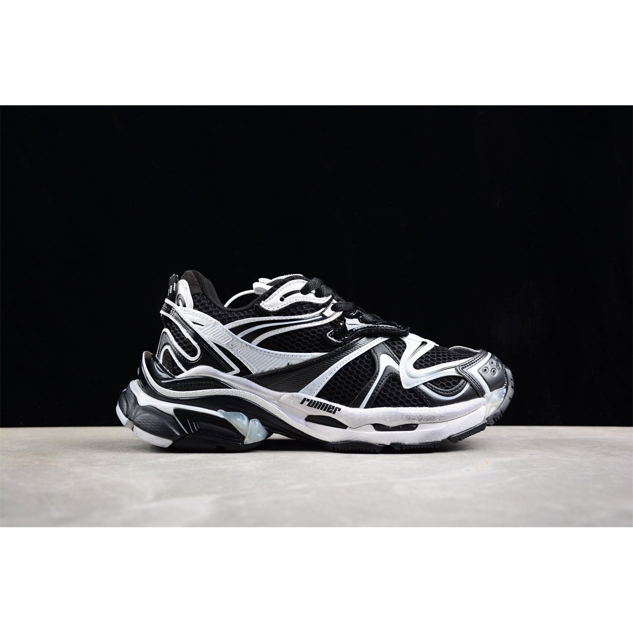 BALENCIAGA Runner - White Sneakers - Black Unisex Streetwear Limited Edition - The BALENCIAGA Runner x Black White sneakers exude a sleek and timeless elegance, perfect for