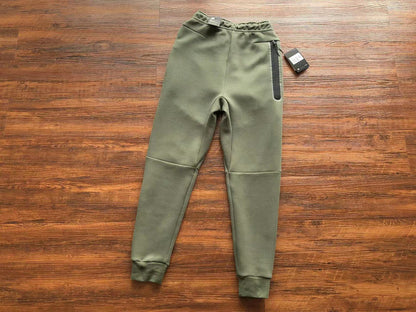 NIKE Tech Fleece Pants - Army - Green Unisex Streetwear Limited Edition - The NIKE TECH FLEECE PANTS ARMY GREEN - REPLICA blend modern athletic performance with sleek