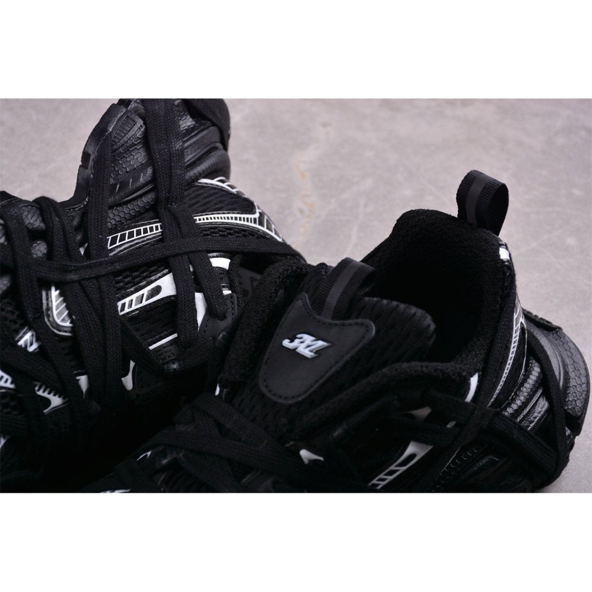 BALENCIAGA 3 - L - White Sneakers - Black Unisex Streetwear Limited Edition - The Balenciaga 3XL x Black White sneakers epitomize the brand's commitment to bold, fashion-forward designs.