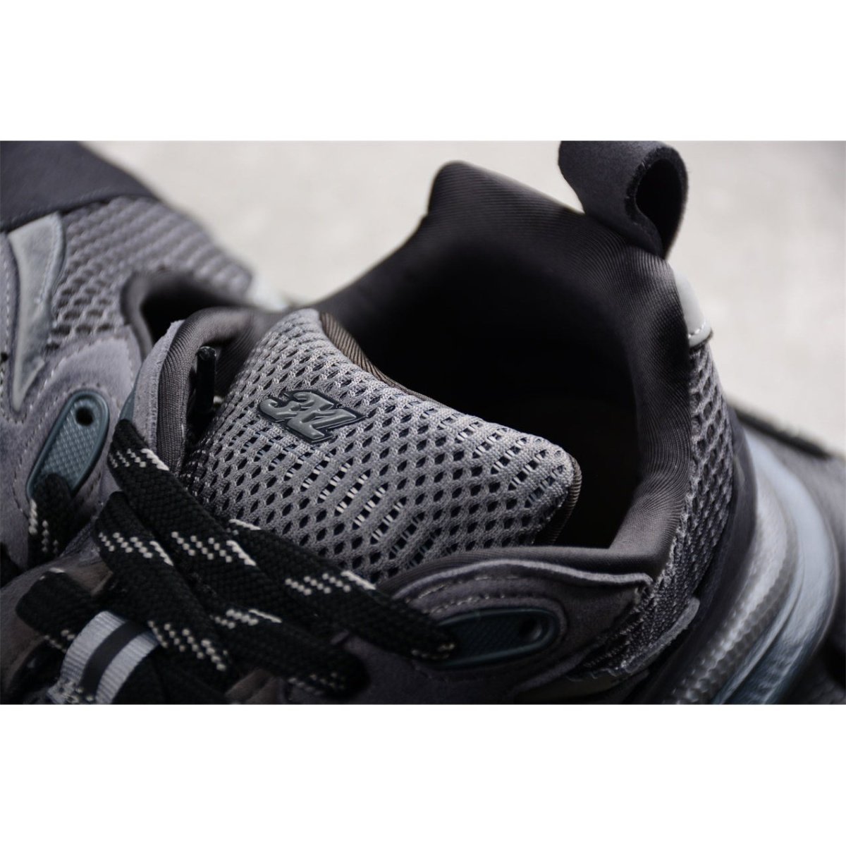 BALENCIAGA 3 - L - Dark Sneakers - Grey Unisex Streetwear Limited Edition - The BALENCIAGA 3XL x Dark Grey sneakers epitomize bold luxury with a monochromatic, understated design.