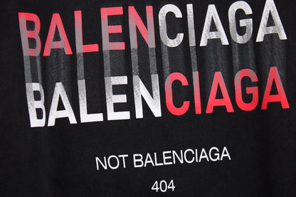 Balenciaga 404 Hoodie - Black Unisex Streetwear Limited Edition - This Balenciaga hoodie features a bold graphic design with the text 'BALENCIAGA' in red and
