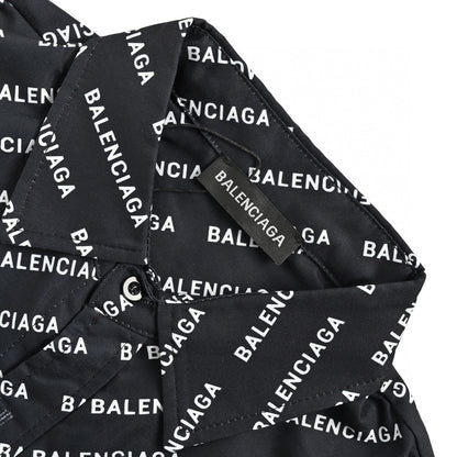 Balenciaga All-over Logo Print Shirt (black) Unisex Streetwear Limited Edition - This black Balenciaga shirt features a striking all-over logo print, offering a bold and modern