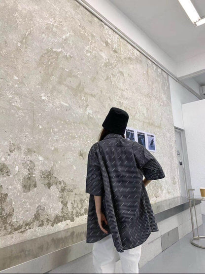 Chemise à carreaux à logo intégral de Balenciaga