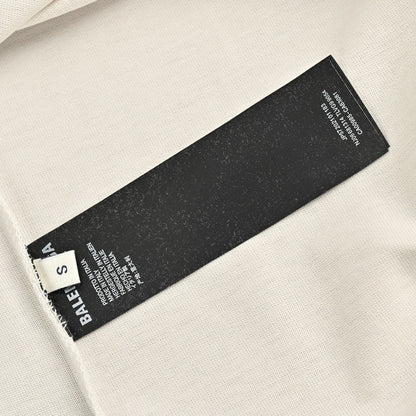 Camiseta Balenciaga beige con estampado abstracto