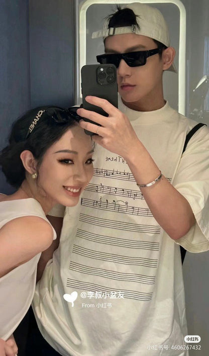 T-shirt beige Balenciaga avec notes de musique