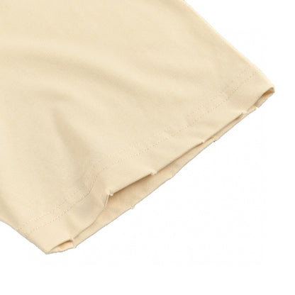 T-shirt beige Balenciaga avec notes de musique