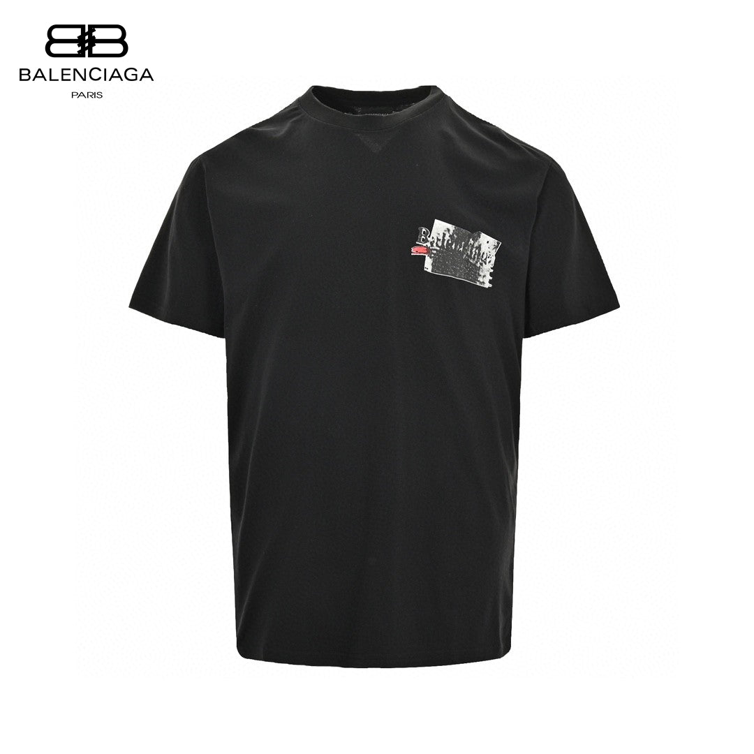 Balenciaga Graphic T-shirt - Black Unisex Streetwear Limited Edition - This Balenciaga t-shirt features a unique design with a small graphic patch on the chest.