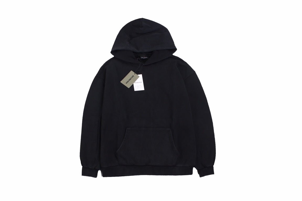 Balenciaga Hoodie - Black Unisex Streetwear Limited Edition - This Balenciaga hoodie features a classic, minimalist black design. It includes a drawstring hood and