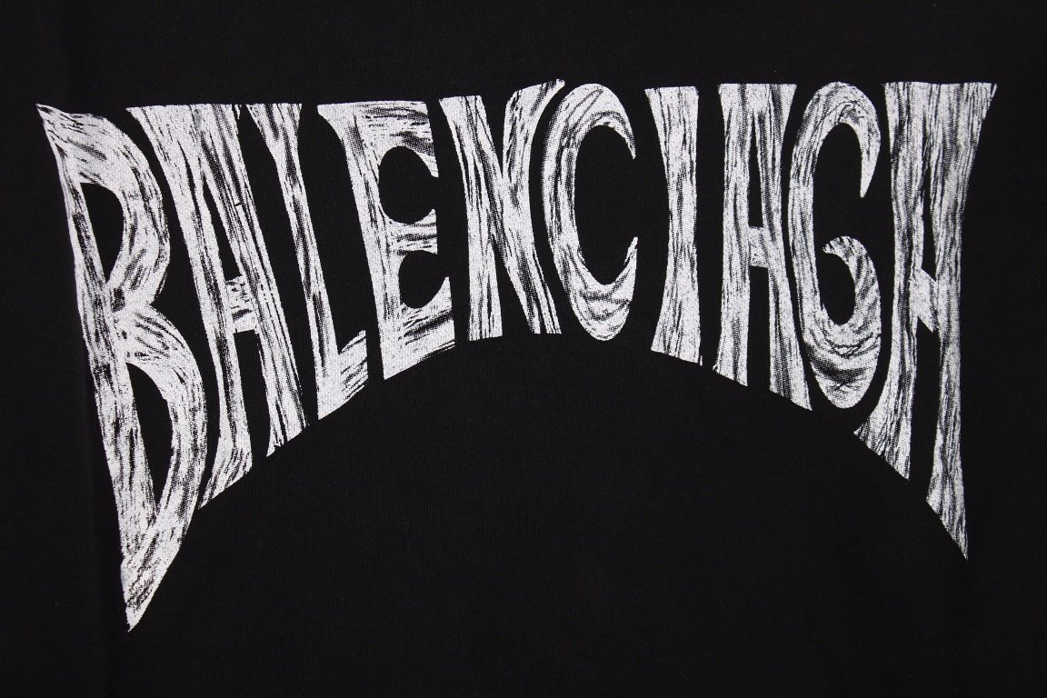 Balenciaga Hoodie - Black Unisex Streetwear Limited Edition - This Balenciaga hoodie features a classic, minimalist black design. It includes a drawstring hood and