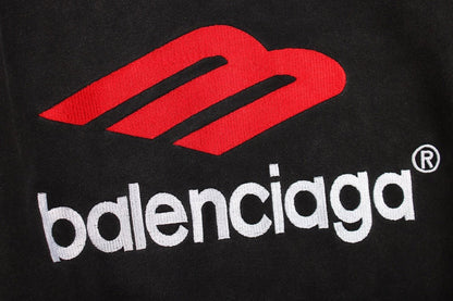 Balenciaga Hoodie - Black Unisex Streetwear Limited Edition - This Balenciaga hoodie features a striking red and white logo on the front. Made from