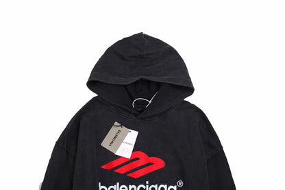 Balenciaga Hoodie - Black Unisex Streetwear Limited Edition - This Balenciaga hoodie features a striking red and white logo on the front. Made from