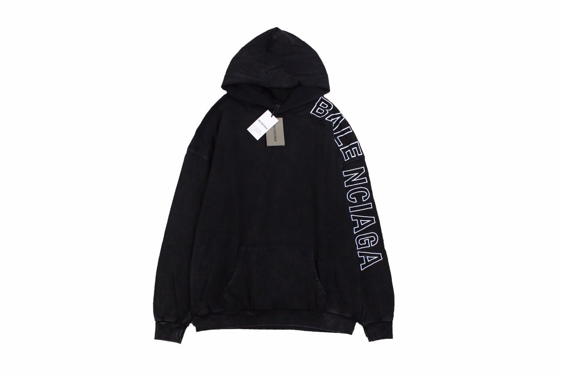 Balenciaga Oversized Hoodie - Black Unisex Streetwear Limited Edition - This Balenciaga hoodie features an oversized fit with a minimalist yet striking design. The black