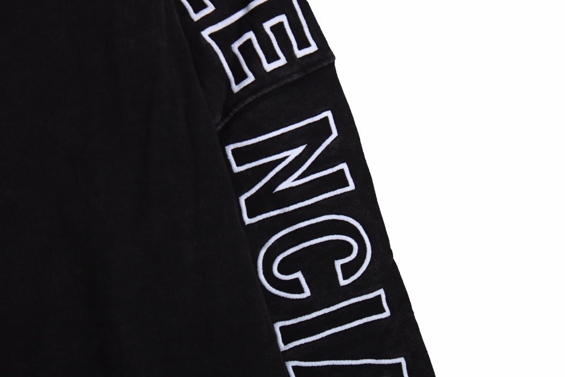 Balenciaga Oversized Hoodie - Black Unisex Streetwear Limited Edition - This Balenciaga hoodie features an oversized fit with a minimalist yet striking design. The black