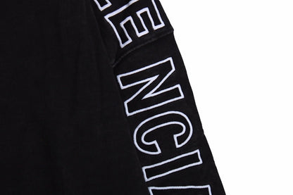 Balenciaga Oversized Hoodie - Black Unisex Streetwear Limited Edition - This Balenciaga hoodie features an oversized fit with a minimalist yet striking design. The black