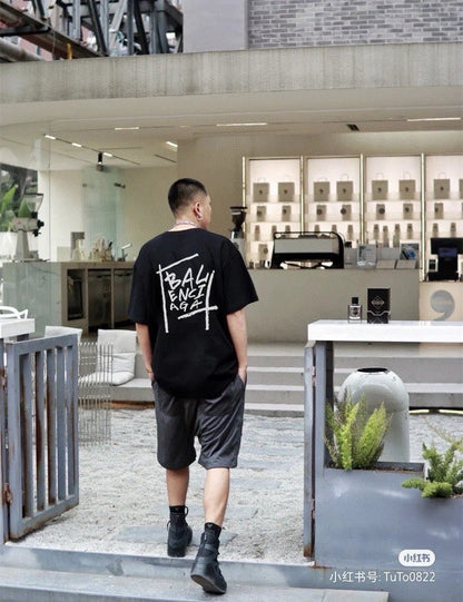 T-shirt noir Balenciaga avec motif graphique audacieux