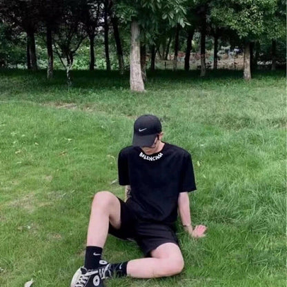 Camiseta Balenciaga con logo distorsionado (negra)