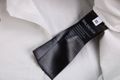 Camiseta Balenciaga con logo desgastado, blanca y gris