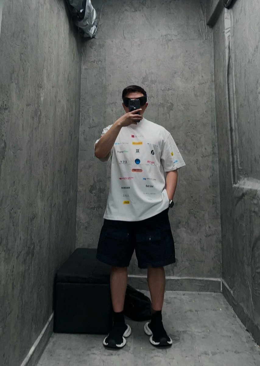 Balenciaga Graphic Print T-shirt - White Unisex Streetwear Limited Edition - <span>This Balenciaga t-shirt showcases a unique and eye-catching graphic print featuring a variety of logos