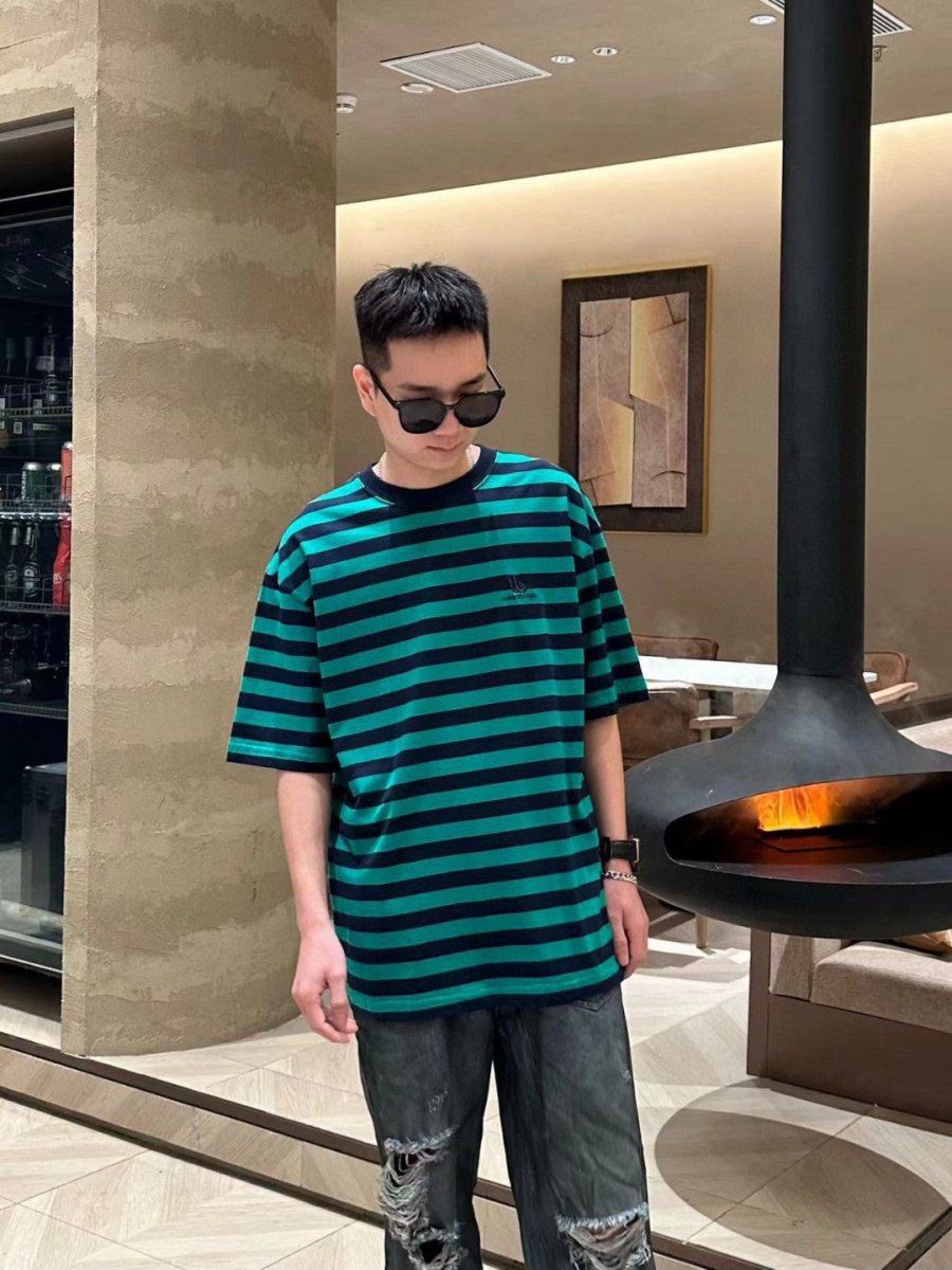 Balenciaga Green And Striped T-shirt - Black Unisex Streetwear Limited Edition - <span>This Balenciaga t-shirt features a stylish green and black striped pattern. Made from high-quality cotton,