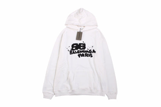 Balenciaga Hoodie - Black Unisex Streetwear Limited Edition - White hoodie with black graffiti-style Balenciaga Paris logo on the chest. Comfortable and relaxed fit.