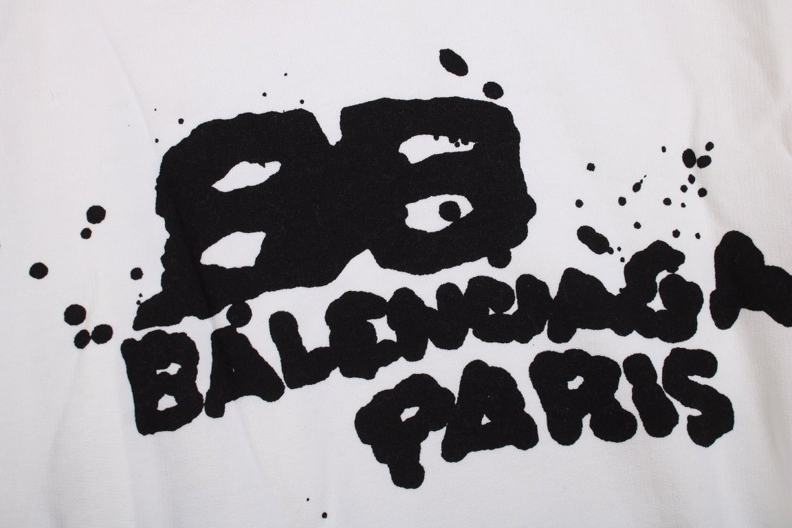 Balenciaga Hoodie - Black Unisex Streetwear Limited Edition - White hoodie with black graffiti-style Balenciaga Paris logo on the chest. Comfortable and relaxed fit.