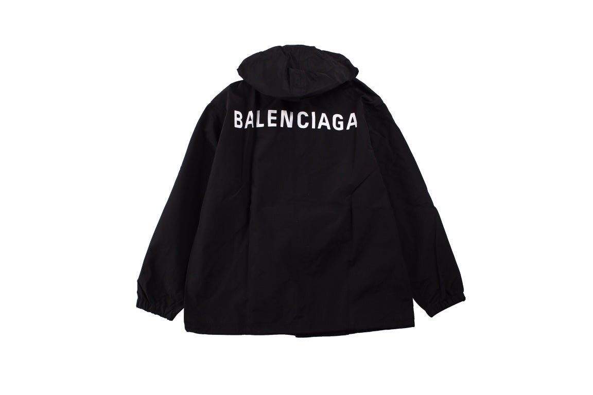 Balenciaga Jacket - Black Unisex Streetwear Limited Edition - Black jacket with hood. Front button closure and side zip pockets. Lightweight and perfect for