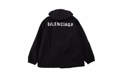 Balenciaga Jacket - Black Unisex Streetwear Limited Edition - Black jacket with hood. Front button closure and side zip pockets. Lightweight and perfect for