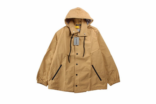 Balenciaga Jacket - Beige Unisex Streetwear Limited Edition - Beige jacket with hood. Front button closure and side zip pockets. Lightweight and perfect for