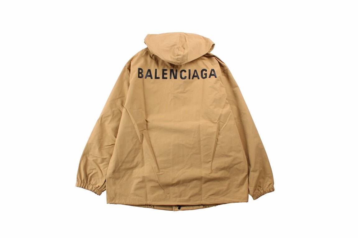 Balenciaga Jacket - Beige Unisex Streetwear Limited Edition - Beige jacket with hood. Front button closure and side zip pockets. Lightweight and perfect for