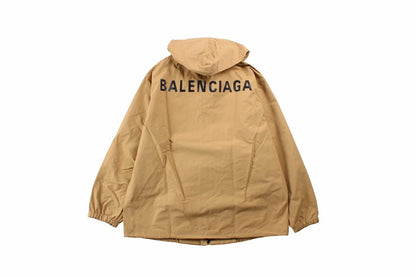 Balenciaga Jacket - Beige Unisex Streetwear Limited Edition - Beige jacket with hood. Front button closure and side zip pockets. Lightweight and perfect for