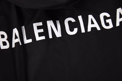 Balenciaga Jacket - Black Unisex Streetwear Limited Edition - Black jacket with hood. Front button closure and side zip pockets. Lightweight and perfect for
