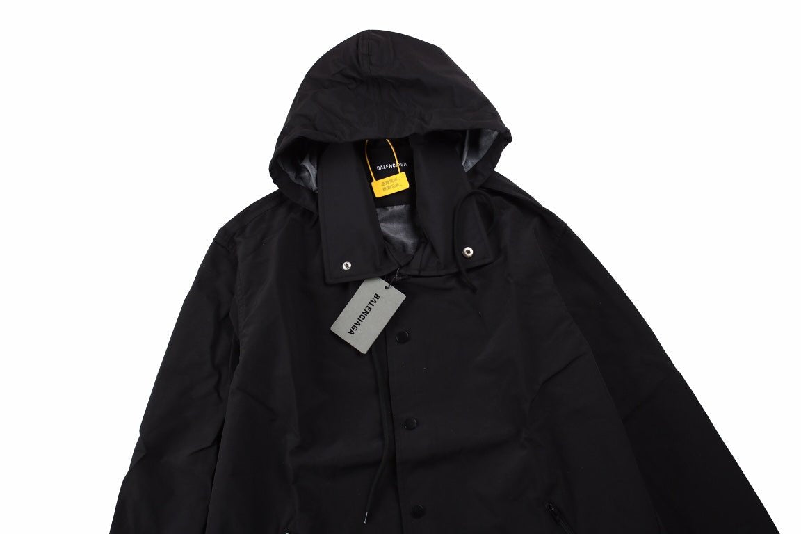 Balenciaga Jacket - Black Unisex Streetwear Limited Edition - Black jacket with hood. Front button closure and side zip pockets. Lightweight and perfect for