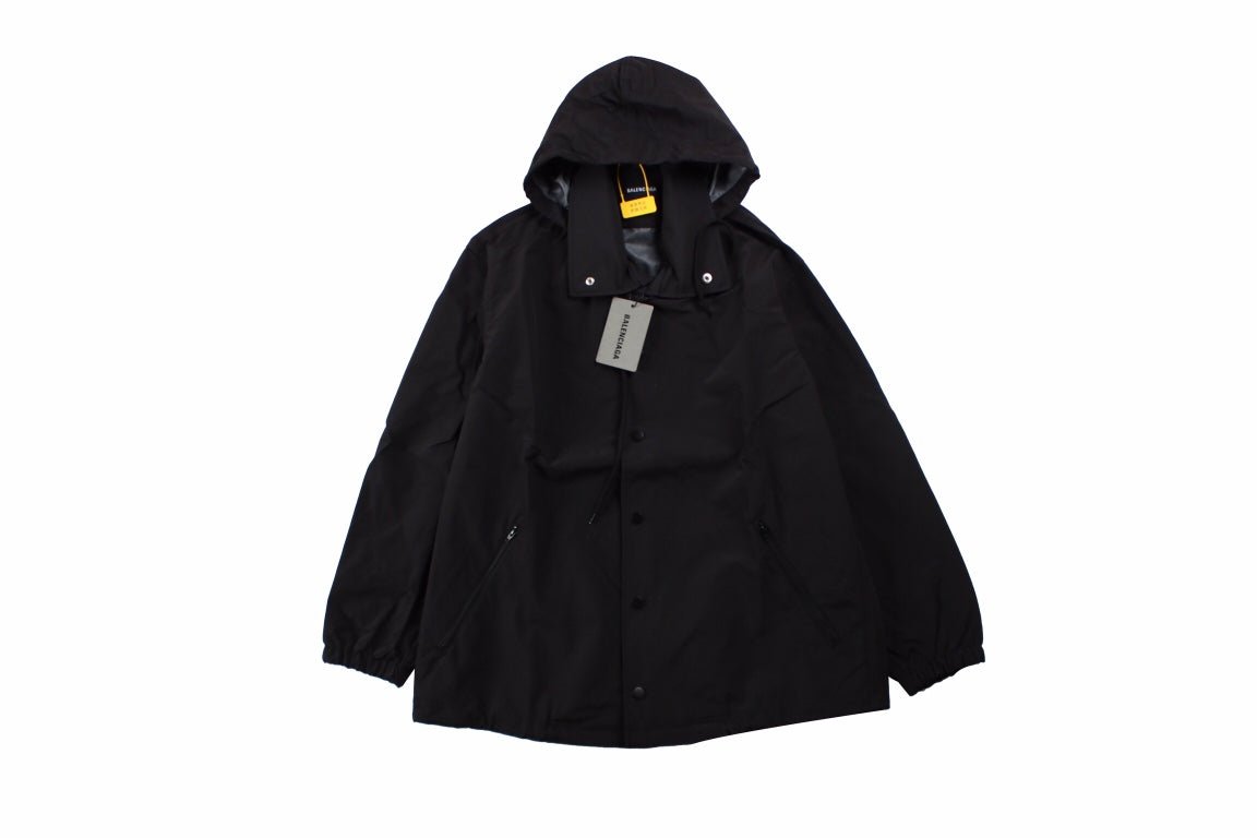 Balenciaga Jacket - Black Unisex Streetwear Limited Edition - Black jacket with hood. Front button closure and side zip pockets. Lightweight and perfect for