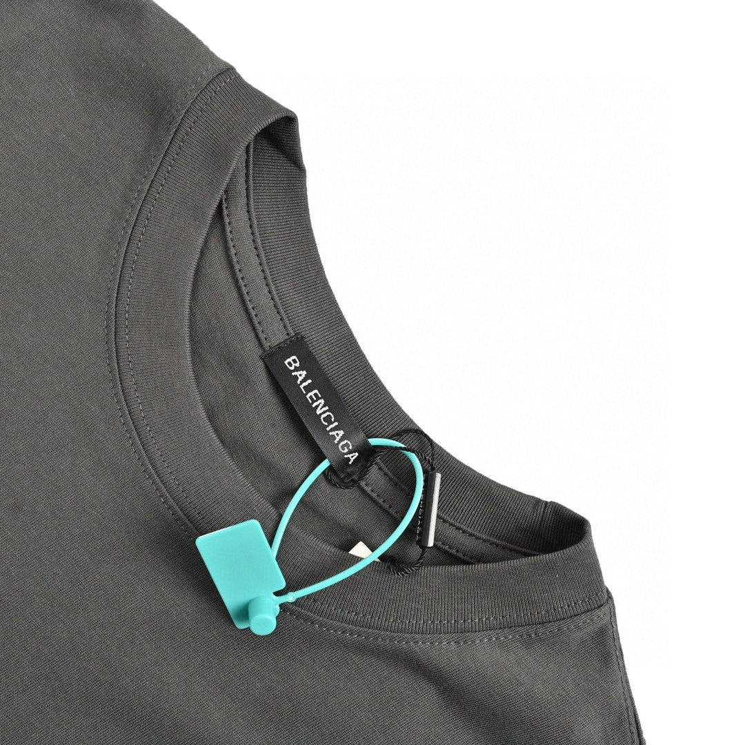 Balenciaga Logo T-shirt - Grey Unisex Streetwear Limited Edition - This Balenciaga Logo T-Shirt features a simple yet stylish design with a small Balenciaga logo