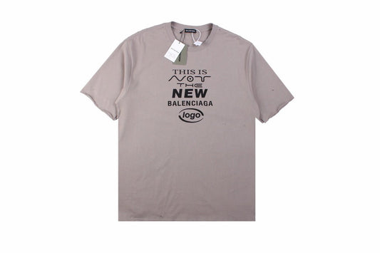 Balenciaga 'this Is Not The New Logo' T-shirt - Red Unisex Streetwear Limited Edition - This unique taupe-colored Balenciaga t-shirt carries a self-aware message, 'This is Not the New Balenciaga