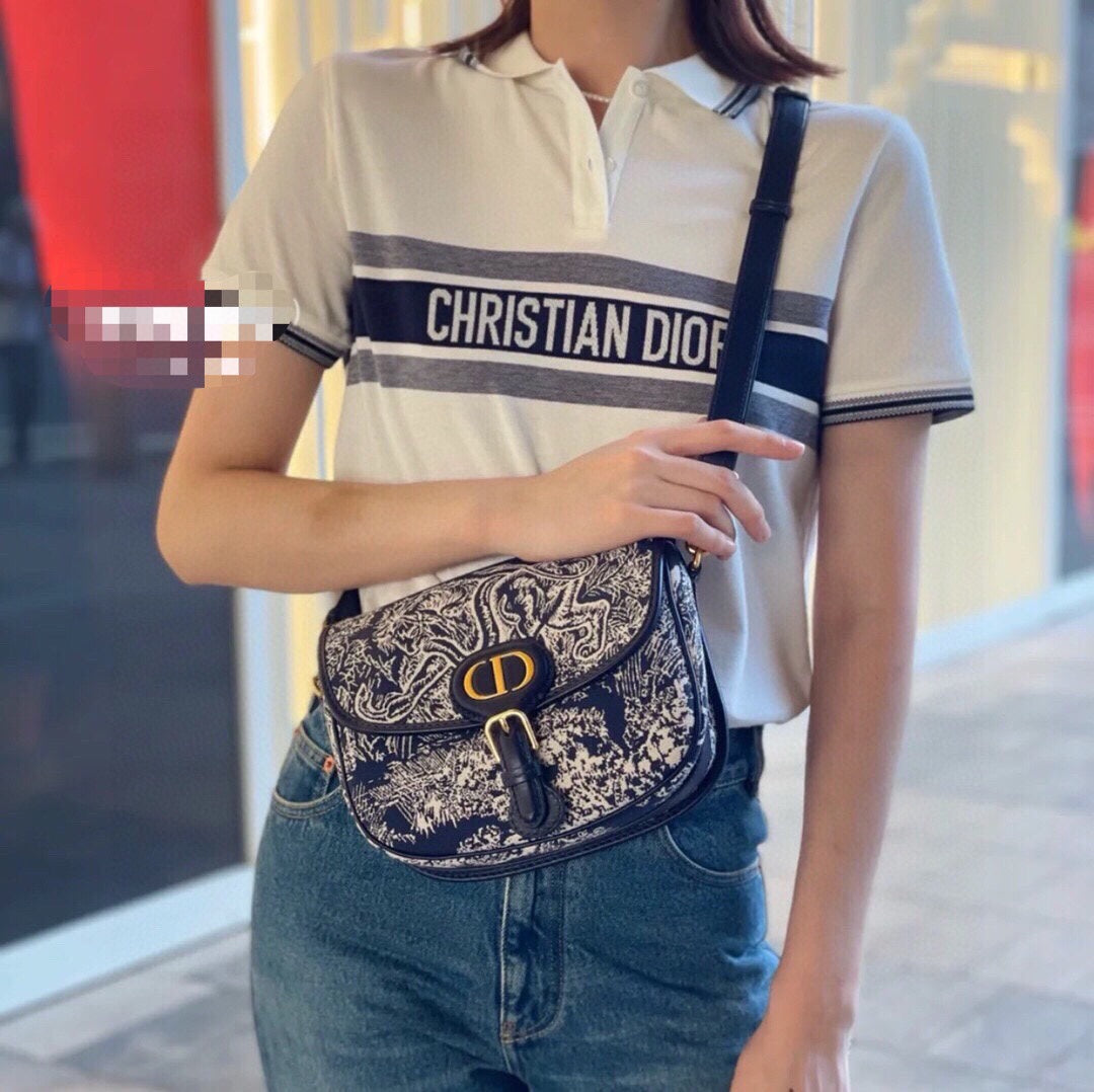Polo Christian Dior con logo a rayas