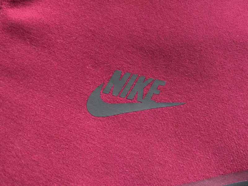 NIKE Tech Fleece Hoodie - Burgundy - Red Unisex Streetwear Limited Edition - The NIKE TECH FLEECE HOODIE BURGUNDY - REPLICA combines modern sportswear innovation with bold streetwear